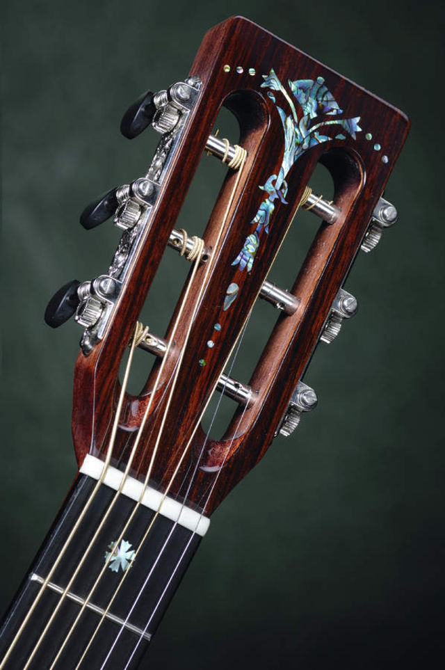 Abalone adorns the Little Wing's headstock and fretboard. Abalone adorns the Little Wing's headstock and fretboard.